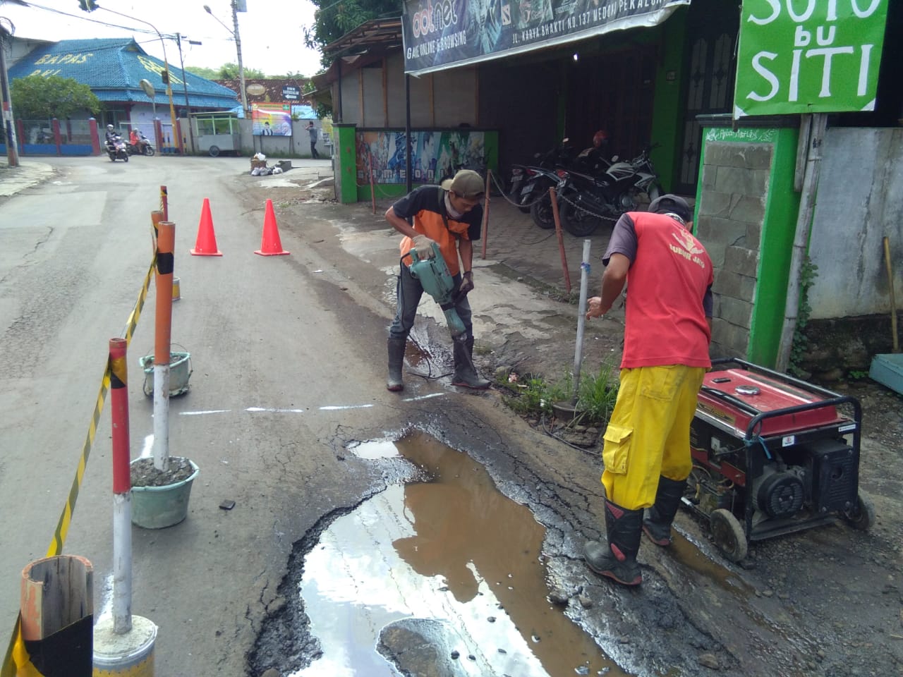Perbaikan Jalan Karya Bhakti