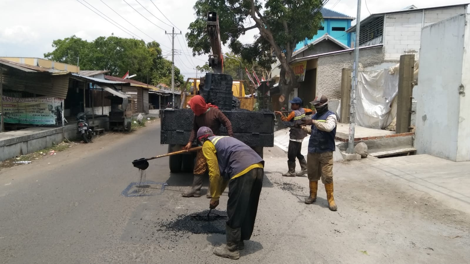 PERBAIKAN JALAN AHMAD YANI