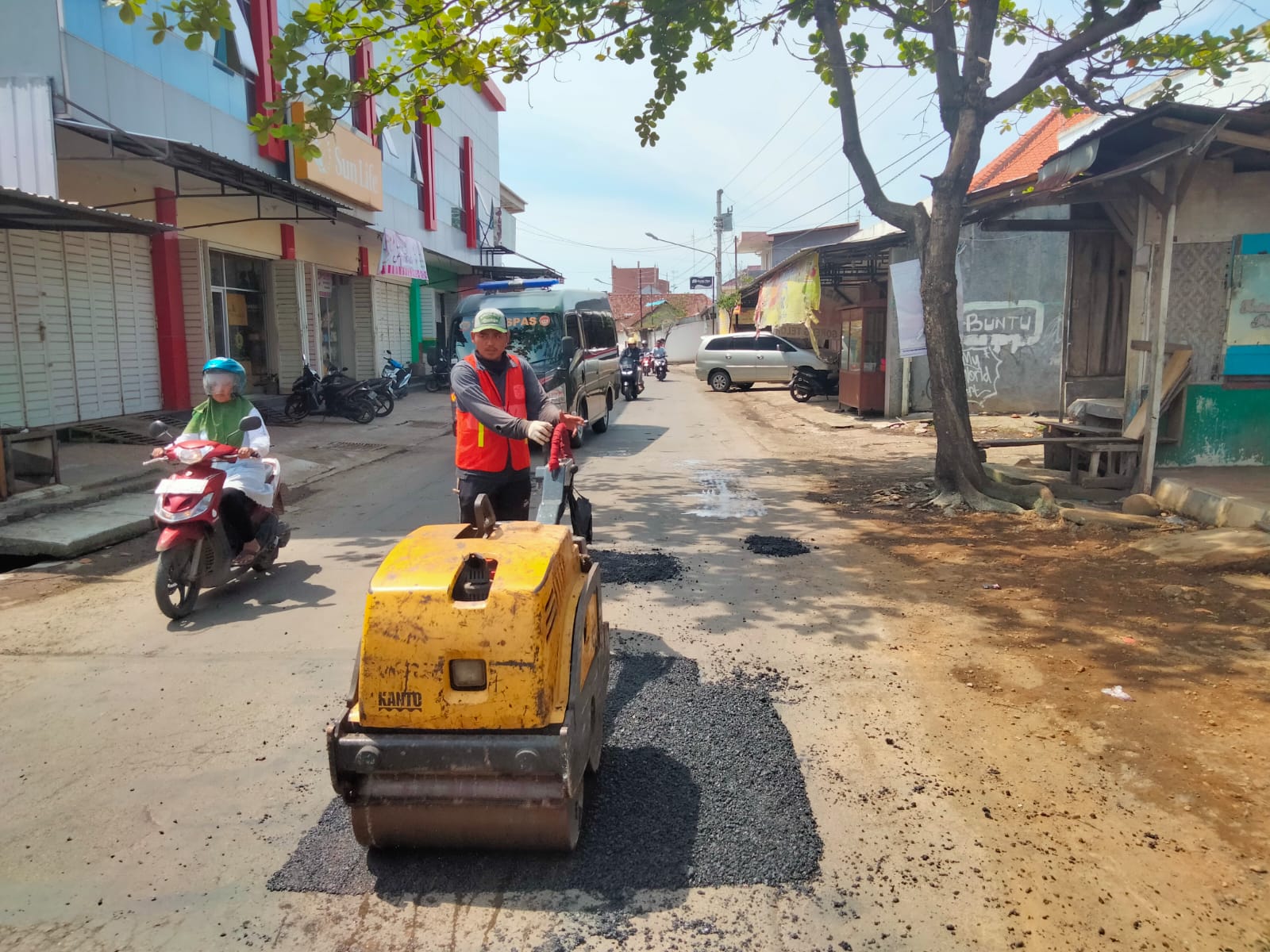 PERBAIKAN JALAN MERAK