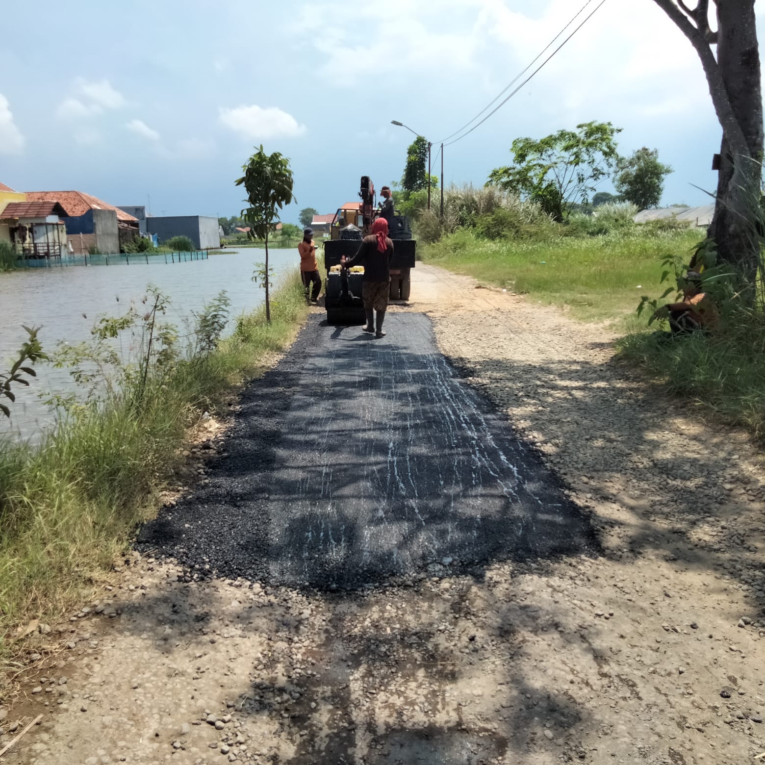 PERBAIKAN JALAN LABUHAN 3 CLUMPRIT