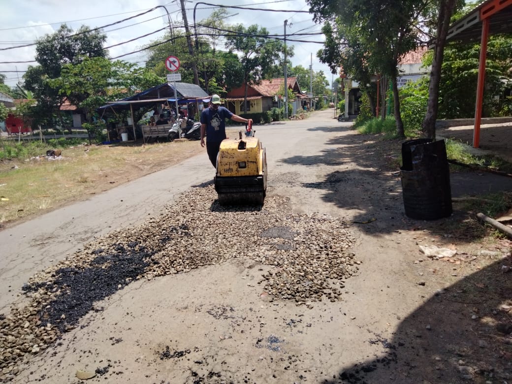 PERBAIKAN JALAN SABRAWI