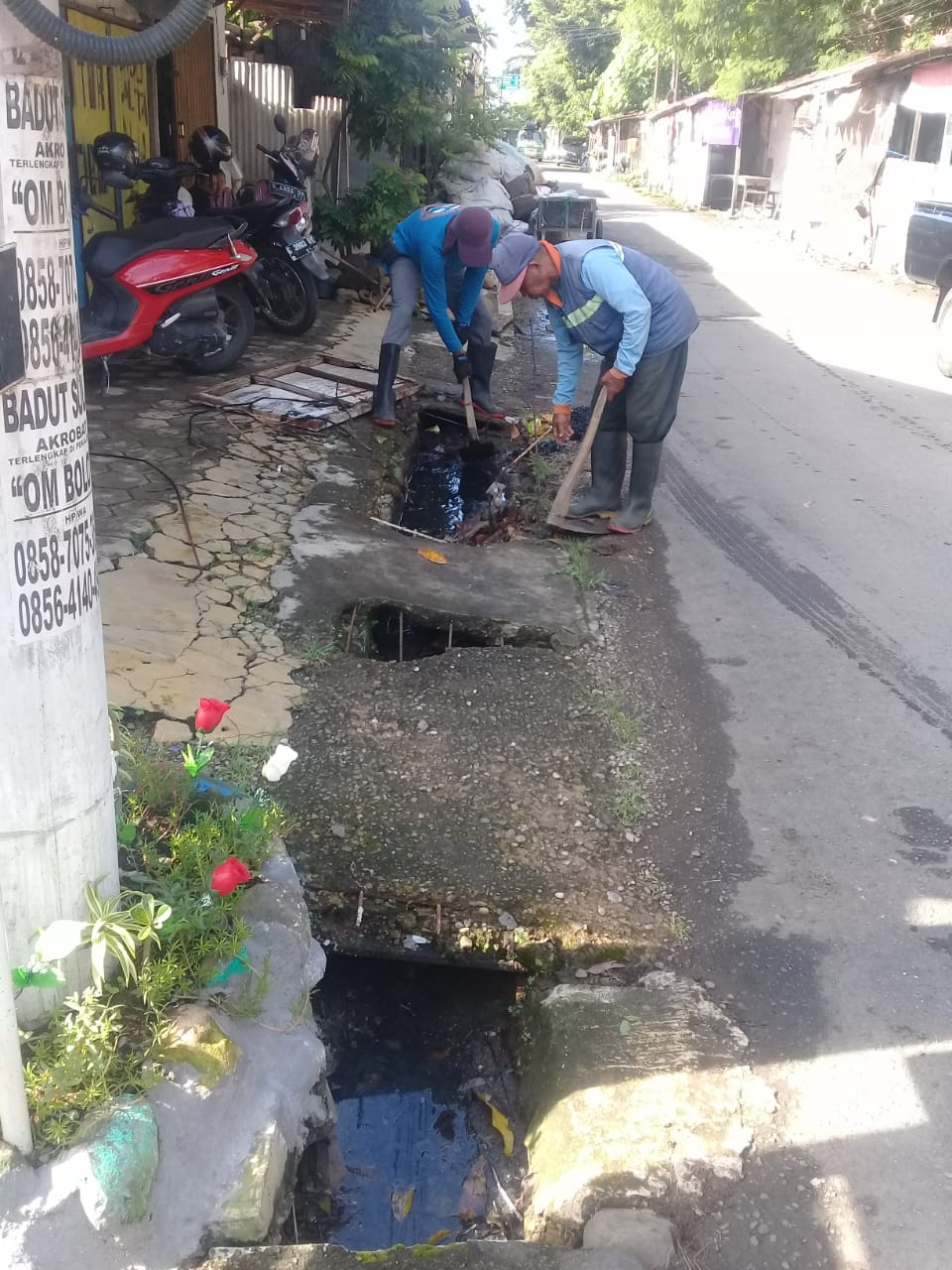 PEMBERSIHAN SALURAN PEMATUS JALAN KALIMANTAN