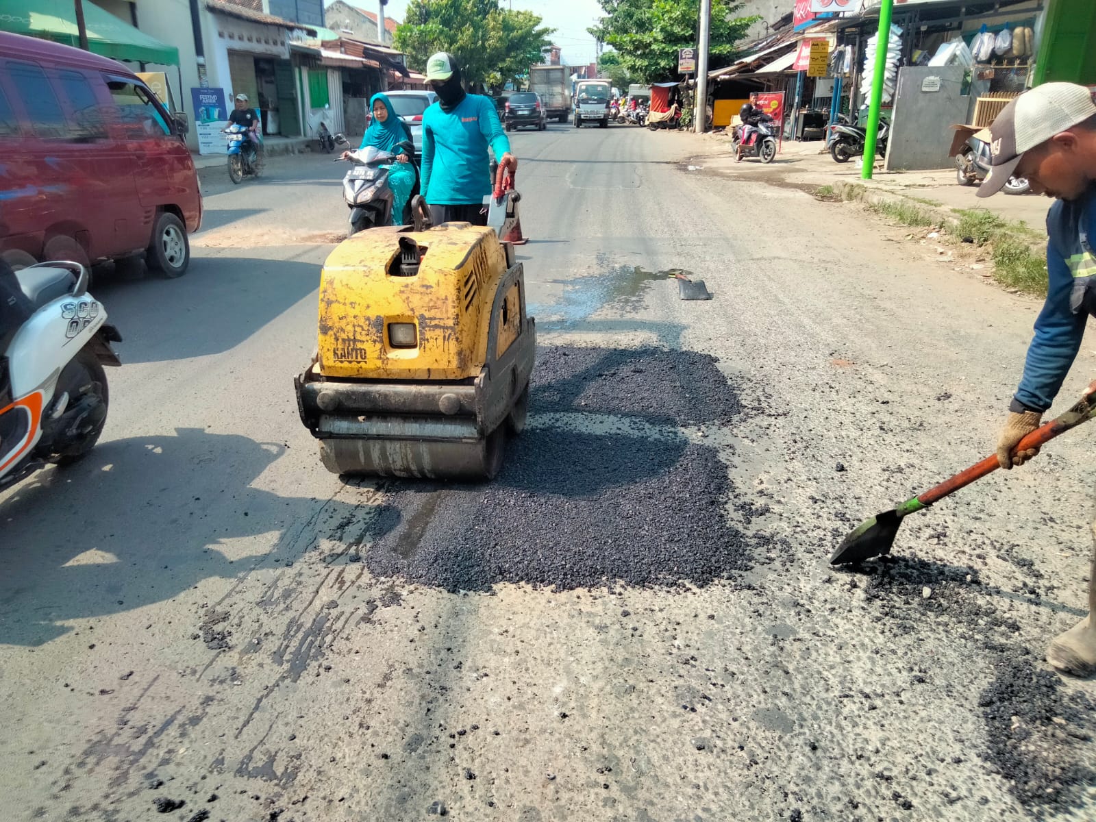 PERBAIKAN JALAN PRAMUKA DAN GATOT SUBROTO