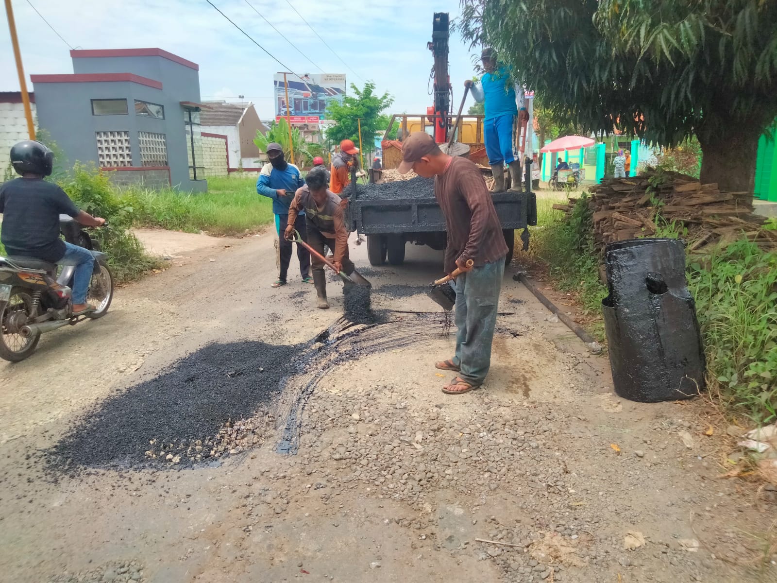 PERBAIKAN JALAN KAPTEN PATIMURA DAN JALAN MANUNGGAL