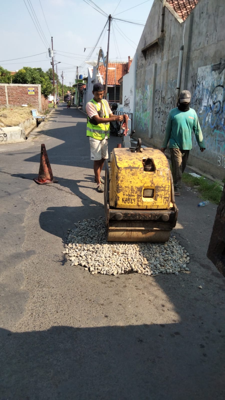 PERBAIKAN JALAN TUNAS DAN ASEM BINATUR